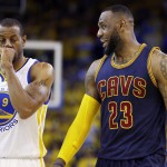 
              Cleveland Cavaliers forward LeBron James (23) smiles next to Golden State Warriors forward Andre Iguodala (9) during the second half of Game 2 of basketball's NBA Finals in Oakland, Calif., Sunday, June 7, 2015. (AP Photo/Ben Margot)
            
