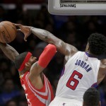 
              Los Angeles Clippers center DeAndre Jordan, right, fouls Houston Rockets forward Josh Smith during the first half of Game 6 in a second-round NBA basketball playoff series in Los Angeles, Thursday, May 14, 2015. (AP Photo/Jae C. Hong)
            