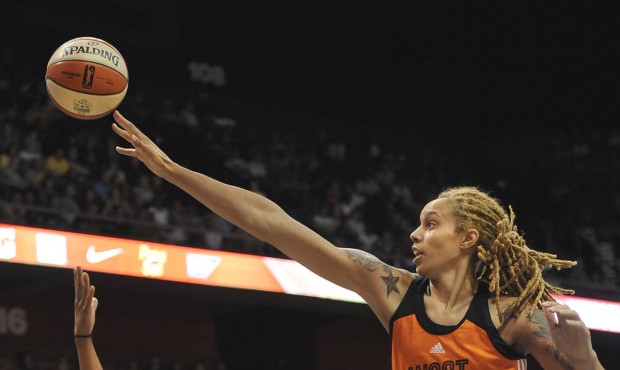 West’s Brittney Griner, right, of the Phoenix Mercury, blocks a shot attempt by East’s ...