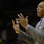 
              FILE - In this March 14, 2015, file photo, Brooklyn Nets' Lionel Hollins gestures during an NBA basketball game against the Philadelphia 76ers  in Philadelphia. Hollins will coach Team World in a game against Team Africa in the NBA's first game in Africa, Aug. 1, in Johannesburg, the league announced Thursday, July 16, 2015.  (AP Photo/Matt Slocum, File)
            