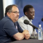 
              Pistons head coach Stan Van Gundy, left, and guard Reggie Jackson talk during a news conference Monday, July 20, 2015, in Auburn Hills, Mich. Pistons have taken care of one priority for this offseason — bringing restricted free agent Jackson back as the team's point guard. (David Guralnick /Detroit News via AP)  DETROIT FREE PRESS OUT; HUFFINGTON POST OUT; MANDATORY CREDIT
            