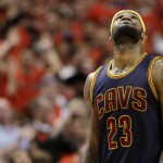 
              Cleveland Cavaliers forward LeBron James looks at the scoreboard after he fouled Chicago Bulls forward Taj Gibson during the second half of Game 3 in a second-round NBA basketball playoff series in Chicago on Friday, May 8, 2015. The Bulls won 99-96. (AP Photo/Nam Y. Huh)
            