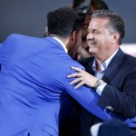               Kentucky coach John Calipari congratulates Devin Booker after Booker was elected 13th overall by the Phoenix Suns during the NBA basketball draft, Thursday, June 25, 2015, in New York. (AP Photo/Kathy Willens)
            