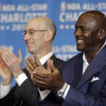 
              Charlotte Hornets owner Michael Jordan, right, and NBA Commissioner Adam Silver, left, applaud a speaker during a news conference, Tuesday, June 23, 2015, to announce Charlotte, N.C., as the site of the 2017 NBA All-Star basketball game. (AP Photo/Chuck Burton)
            