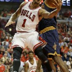 
              Chicago Bulls guard Derrick Rose (1) drives to the basket past Cleveland Cavaliers forward LeBron James during the second half of Game 3 in a second-round NBA basketball playoff series in Chicago on Friday, May 8, 2015. (AP Photo/Nam Y. Huh)
            