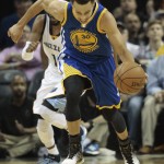 
              Golden State Warriors guard Stephen Curry (30) moves the ball against Memphis Grizzlies guard Mike Conley (11) in the first half of Game 3 of a second-round NBA basketball Western Conference playoff series Saturday, May 9, 2015, in Memphis, Tenn. (AP Photo/Mark Humphrey)
            
