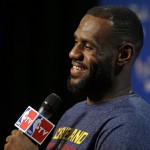 
              Cleveland Cavaliers forward LeBron James answers a question during a press conference for basketball's NBA Finals in Cleveland, Wednesday, June 10, 2015. The  Cavaliers lead the Warriors 2-1 in the best-of-seven games series.  Game 4 is scheduled for  Thursday. (AP Photo/Michael Conroy)
            