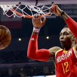 
              Houston Rockets center Dwight Howard dunks against the Los Angeles Clippers during the first half of Game 3 in a second-round NBA basketball playoff series Friday, May 8, 2015, in Los Angeles. (AP Photo/Jae C. Hong)
            