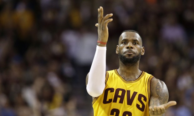 Cleveland Cavaliers forward LeBron James (23) celebrates a play against the Golden State Warriors d...