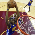 
              Golden State Warriors center Festus Ezeli (31) dunks during the first half of Game 6 of basketball's NBA Finals against the Cleveland Cavaliers, in Cleveland, Tuesday, June 16, 2015.  (AP Photo/Bob Donnan/Pool via AP)
            