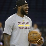 
              Cleveland Cavaliers' LeBron James smiles during NBA basketball practice, Wednesday, June 3, 2015, in Oakland, Calif. The Golden State Warriors host the Cavaliers in Game 1 of the NBA Finals on Thursday. (AP Photo/Ben Margot)
            