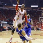 
              Houston Rockets center Dwight Howard (12) shoots over Los Angeles Clippers forward Blake Griffin (32) during the first half in Game 7 of the NBA basketball Western Conference semifinals Sunday, May 17, 2015, in Houston. (AP Photo/David J. Phillip)
            
