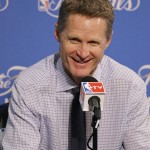 
              Golden State Warriors head coach Steve Kerr smiles during a news conference after Game 5 of basketball's NBA Finals against the Cleveland Cavaliers Sunday, June 14, 2015, in Oakland, Calif. The Warriors won 104-91. (AP Photo/Ben Margot)
            