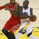 
              Golden State Warriors forward Draymond Green (23) drives against Houston Rockets forward Josh Smith during the first half of Game 5 of the NBA basketball Western Conference finals in Oakland, Calif., Wednesday, May 27, 2015. (AP Photo/Tony Avelar)
            