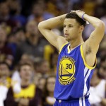 
              Golden State Warriors guard Stephen Curry (30) watches as the referees check a replay during the second half of Game 3 of basketball's NBA Finals against the Cleveland Cavaliers in Cleveland, Tuesday, June 9, 2015. The Cavaliers defeated the Warriors 96-91. AP Photo/Tony Dejak)
            