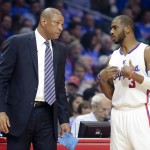 
              Los Angeles Clippers head coach Doc Rivers talks with guard Chris Paul during the first half of Game 3 in a second-round NBA basketball playoff series against the Houston Rockets, Friday, May 8, 2015, in Los Angeles. (AP Photo/Jae C. Hong)
            