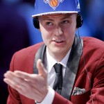 
              Kristaps Porzingis answers questions during an interview after being selected fourth overall by the New York Knicks during the NBA basketball draft, Thursday, June 25, 2015, in New York. (AP Photo/Kathy Willens)
            