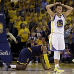 
              Golden State Warriors guard Stephen Curry (30) reacts after being called for a foul on Cleveland Cavaliers forward LeBron James, left, during the second half of Game 2 of basketball's NBA Finals in Oakland, Calif., Sunday, June 7, 2015. (AP Photo/Ben Margot)
            