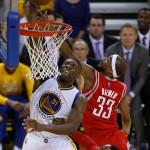
              Golden State Warriors center Festus Ezeli (31) dunks against Houston Rockets guard Corey Brewer (33) during the first half of Game 5 of the NBA basketball Western Conference finals in Oakland, Calif., Wednesday, May 27, 2015. (AP Photo/Tony Avelar)
            