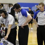 
              Officials Kevin Scott, from left, Andy O'Brien and Rusty Phillips look over a replay monitor during the first half of an NBA summer league basketball game between the Orlando Magic Blue and the Memphis Grizzlies , Tuesday, July 7, 2015, in Orlando, Fla. (AP Photo/John Raoux)
            