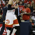 
              Atlanta Hawks guard Kyle Korver (26) walks off the court after being injured against the Cleveland Cavaliers during the second half in Game 2 of the Eastern Conference finals of the NBA basketball playoffs, Friday, May 22, 2015, in Atlanta. (AP Photo/David Goldman)
            