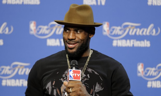 Cleveland Cavaliers forward LeBron James (23) answers a question during a press conference followin...