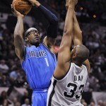               FILE - In this March 27, 2015, file photo, Dallas Mavericks forward Amare Stoudemire (1) shoots against San Antonio Spurs forward Boris Diaw during the first half of an NBA basketball game in San Antonio. Stoudemire took a minimal contract from the Miami Heat, though he isn't expecting a minimal role. The six-time All-Star is returning to his native Florida and thinks the Heat will be contenders in the Eastern Conference. (AP Photo/Darren Abate, File)
            