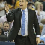 
              Memphis Grizzlies head coach David Joerger speaks to players against the Golden State Warriors in the first half of Game 3 of a second-round NBA basketball Western Conference playoff series Saturday, May 9, 2015, in Memphis, Tenn. (AP Photo/Mark Humphrey)
            