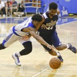               Detroit Pistons' Stanley Johnson, left, and Indiana Pacers' Solomon Hill (44) go after a loose ball during the first half of an NBA summer league basketball game, Wednesday, July 8, 2015, in Orlando, Fla. (AP Photo/John Raoux)
            