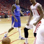               Houston Rockets forward Terrence Jones (6) celebrates as Los Angeles Clippers guard Jamal Crawford (11) looks during the first half in Game 7 of the NBA basketball Western Conference semifinals Sunday, May 17, 2015, in Houston. (AP Photo/David J. Phillip)
            