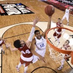 
              FILE - In this April 4, 2015, file photo, Kentucky's Karl-Anthony Towns (12) drives to the basket past Wisconsin's Frank Kaminsky (44) during the first half of the NCAA Final Four national semifinal college basketball game in Indianapolis. Small ball was the story of the NBA Finals. It might seem temporarily forgotten at the start of the NBA draft. The first three players taken Thursday, June 25, 2015, could easily be a trio of big guys, led by Kentucky's Karl-Anthony Towns.   (Chris Steppig/NCAA Photos via AP, Pool, File)
            
