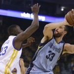 
              Memphis Grizzlies center Marc Gasol (33) shoots against Golden State Warriors forward Draymond Green during the first half of Game 5 in a second-round NBA playoff basketball series in Oakland, Calif., Wednesday, May 13, 2015. (AP Photo/Ben Margot)
            