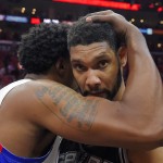 
              Los Angeles Clippers center DeAndre Jordan, left, hugs San Antonio Spurs forward Tim Duncan after the Clippers defeated the Spurs in Game 7 in a first-round NBA basketball playoff series, Saturday, May 2, 2015, in Los Angeles. The Clippers won 111-109. (AP Photo/Mark J. Terrill)
            