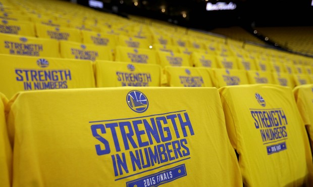 Golden State Warriors t-shirts are shown on seats at Oracle Arena before Game 1 of basketball&#8217...