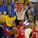 
              Houston Rockets center Dwight Howard (12) blocks a shot by Golden State Warriors forward Andre Iguodala during the first half of Game 5 of the NBA basketball Western Conference finals in Oakland, Calif., Wednesday, May 27, 2015. (AP Photo/Tony Avelar)
            