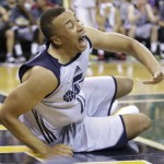 
              Utah Jazz's Dante Exum (11) reacts after being injured during the second half of an NBA summer league basketball game against the Boston Celtics Monday, July 6, 2015, in Salt Lake City. The Jazz won 100-82. (AP Photo/Rick Bowmer)
            