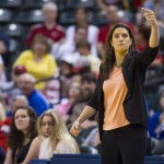 
              Indiana Fever head coach Stephanie White directs the players on the court from the bench during an WNBA basketball game against the Chicago Sky, Sunday, June 14, 2015, in Indianapolis. (AP Photo/Doug McSchooler)
            
