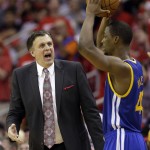               Houston Rockets head coach Kevin McHale, left, shouts as Golden State Warriors forward Harrison Barnes (40) looks to pass during the second half in Game 3 of the NBA basketball Western Conference finals Saturday, May 23, 2015, in Houston. (AP Photo/David J. Phillip)
            