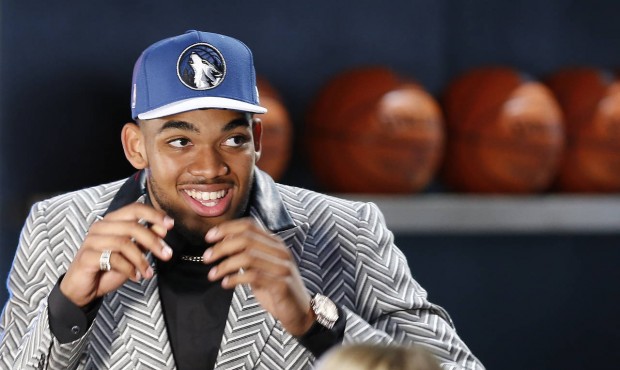 Karl-Anthony Towns reacts after being selected first overall by the Minnesota Timberwolves during t...