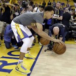 
              Golden State Warriors guard Stephen Curry warms up before Game 1 of basketball's NBA Finals against the Cleveland Cavaliers in Oakland, Calif., Thursday, June 4, 2015. (AP Photo/Ben Margot)
            