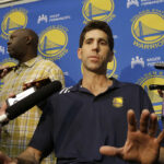 Golden State Warriors general manager Bob Myers speaks to reporters at the team's practice facility in Oakland, Calif., Thursday, June 18, 2015. The Warriors believe their first title in 40 years could be the first of many more. With their young core signed long-term and MVP Stephen Curry just entering his prime, the Warriors are certainly set up to make several championship runs. (AP Photo/Jeff Chiu)
            