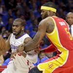 
              Los Angeles Clippers guard Chris Paul, left, drives around Houston Rockets forward Josh Smith during the first half of Game 3 in a second-round NBA basketball playoff series Friday, May 8, 2015, in Los Angeles. (AP Photo/Jae C. Hong)
            