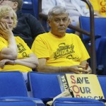 
              Cindy Dronyk, left, and Mike Dronyk, franchise-long season ticket holders, watch the Tulsa Schock during the fourth quarter of a WNBA basketball game against the Washington Mystic in Tulsa, Okla., Tuesday, July 21, 2015. Washington won 76-69. Shock majority owner  Bill Cameron announced plans to move the franchise to the Dallas-Fort Worth market as early as next season. (AP Photo/Sue Ogrocki)
            