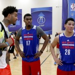 
              Kentucky's Willie Cauley-Stein, left, and teammates Dakari Johnson (87) and Devin Booker talk at the NBA basketball combine Friday, May 15, 2015, in Chicago. (AP Photo/Charles Rex Arbogast)
            