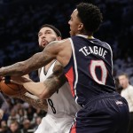 
              Atlanta Hawks' Jeff Teague, right, defends Brooklyn Nets' Deron Williams during the first half of Game 6 in a first round NBA playoff basketball game Friday, May 1, 2015, in New York. (AP Photo/Frank Franklin II)
            