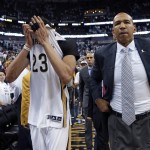
              FILE - In this April 25, 2015, file photo, New Orleans Pelicans forward Anthony Davis (23) and head coach Monty Williams walk off the court after losing 109-98 to the Golden State Warriors in Game 4 in the first round of the NBA basketball playoffs in New Orleans. The Pelicans fired Williams on Tuesday, May 12, 2015. (AP Photo/Gerald Herbert, File)
            