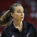 
              Becky Hammon coaches the San Antonio Spurs during an NBA summer league basketball game against the New York Knicks on Saturday, July 11, 2015, in Las Vegas. (AP Photo/Ronda Churchill)
            