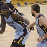 
              Memphis Grizzlies forward Zach Randolph, left, reacts after scoring, next to center Marc Gasol during the first half of Game 5 in a second-round NBA playoff basketball series against the Golden State Warriors in Oakland, Calif., Wednesday, May 13, 2015. (AP Photo/Jeff Chiu)
            