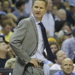 
              Golden State Warriors head coach Steve Kerr watches play against the Memphis Grizzlies in the first half of Game 4 of a second-round NBA basketball Western Conference playoff series Monday, May 11, 2015, in Memphis, Tenn. (AP Photo/Mark Humphrey)
            