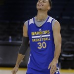 
              Golden State Warriors' Stephen Curry smiles during NBA basketball practice, Friday, June 5, 2015, in Oakland, Calif. The Golden State Warriors host the Cleveland Cavaliers in Game 2 of the NBA Finals on Sunday. (AP Photo/Ben Margot)
            